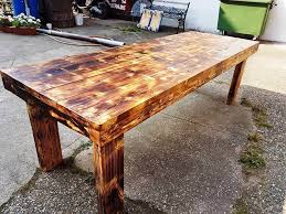 Convertible coffee tables that can be raised to dining height, with or without the option of an expanding surface area, and. Fancy Dining Table From Pallets And Old Beams