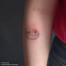 Forearm Birth Year Tattoo Designs Birthday Cake Tattoo On The Forearm Food Tattoos Tattoo Cake Tattoos