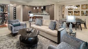 Whether you're coming from a long day at the office or for a night out with friends, the living room is always a good call. Couple Updates Scottsdale Waterfront Residences Condo Into Cool Home