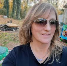 Grandmother introduces herself and shares a photo with her granddaughter