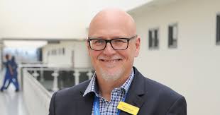 Gavin Boyle named as prospective chief executive should merger between  Burton and Derby hospitals go ahead