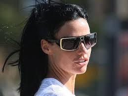 Katie Price hits Ibiza determined to have some fun