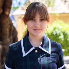 I loved seeing the really cool black and white photos from the past 100  years! It was interesting to see some things that were different like the  uniforms and the SRC badges,