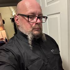 What are good female tattoo artists for a cover up?