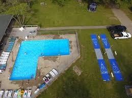 Heated swimming pool, good bass fishing, shaded grassy sites and game room. Bazan Baldwin Oaks Family Campground Llc