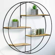 Elle affiche un style épuré sans fioritures, associé à une fonctionnalité non négligeable. Etagere Murale Ronde Lily 4 Niveaux Bois Et Metal Design Industriel Cdiscount Maison