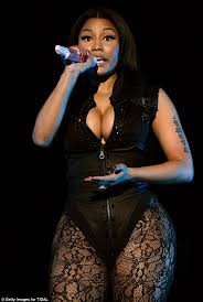 Rapper and 'feeling myself' music video star, nicki minaj, is the july 2015 cover star of cosmopolitan, flaunting her curves in a glittering bodysuit. Nicki Minaj Is Up To Risque Tricks In With Beyonce At Tidal X Charity Concert Daily Mail Online