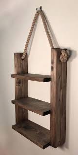 Rustic Ladder Shelf Rustic Wood And Rope Ladder Shelf Rusticfurniture Hanging Wood Shelves Wood Diy Wood Projects