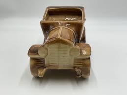 Image result for Pottery Brown 1931 Oldsmobile
