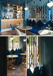 Design Detail Room Dividers In This Restaurant Help To Define The Seating Areas Decorative Room Dividers Restaurant Interior Design Cafe Interior Design