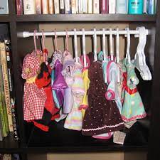 Tension curtain rod:adjustable length of the tension rod ranges from 15.7 inches to 28 inches, which can be adjusted freely according to the different widths of your closet, closet and window and so on. Closet For Doll Clothes In A Small Bookshelf Cubby Using A Tension Rod This Is An Expedit Bookshelf Short Te Small Baby Nursery Baby Doll Clothes Diy Doll