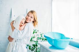 Your baby will probably calm down as she feels your body against hers, along with the warm water and change of scenery. How To Take A Bath Or Shower With Your Baby Epic Guide Piece Of Cake Parenting