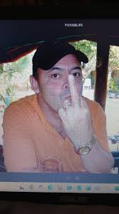 Hi, I just lost my dad. (on the picture right with the white shorts) I  really want to hang this picture in my living room but can somebody remove  te guy on