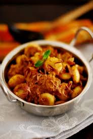 Erachi Pidi Rice Dumplings Cooked In Spicy Meat Gravy Kerala Recipe Meat Gravy Cooking Indian Food Recipes
