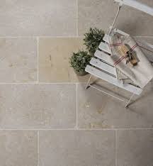 Dijon limestone tumbled tiles continues to lead the popularity stakes in tumbled stones. Wychwood Eco Limestone Tumbled Finish Artisans Of Devizes Patio Tiles Patio Flooring Limestone Patio