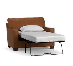 This futon is roughly the size of a standard twin mattress when in the flat position. Buchanan Square Arm Leather Twin Sleeper Sofa Pottery Barn