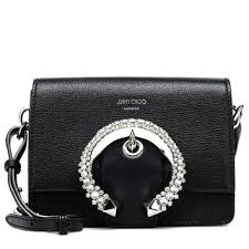 Swirling floral motifs in shades of camel and maroon adorn the. Jimmy Choo Handbags At House Of Fraser