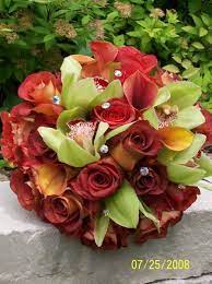 Not only does this bundle of beautiful flowers and greenery highlight your gown, but it should reflect your theme or décor as well. Wedding Flowers Red Wedding Flower Arrangements Red Wedding Flowers Red Bouquet Wedding