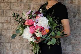 Flowers for every wedding season. White And Pink Peony Purple Stock Garden Rose And Orange Ranunculus Bridal Bouquet June Weddin Wedding Bridal Bouquets Ranunculus Bridal Bouquet Bridal Bouquet