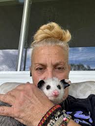 I think i have more pics with my opposum now than I do with my kids