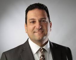 Sports editor Bill Corey is in the thick of the action