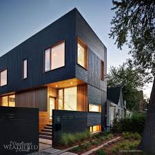 Stunning Modern Home With Dark Wood Siding Reclaimed Wood Isn T Just For The Rust Wood Siding Exterior Exterior House Colors Combinations Exterior House Doors
