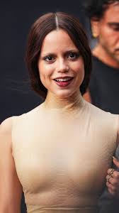 Jenna Ortega says Tim Burton is "just a freak" — in the best way possible.  They reunited for the second season of the Netflix hit "Wednesday."