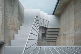 tato architects animates hotel with colorful curtains and eclectic furnishings architect hotel architecture