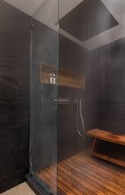The vented design may not be as pronounced as other teak shower mats, but it still does its job efficiently in draining off the water quickly. Trapeze Stair Duplex By Andrew Mikhael Architect Teak Bathroom Teak Shower Teak Shower Floor