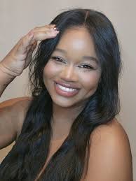 Can I get some assistance with making this photo more professional for an  ID badge. Thank you in advance:)