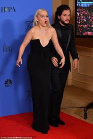 As i sat down in the stall. Emilia Clarke Gets Giggles With Got S Gwendoline Christie Daily Mail Online