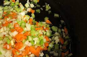 I am talking about the louisiana holy trinity in cooking, whichâ refers specifically to chopped celery, bell peppers, and onions, used as the staple base . Foodista The Holy Trinity Of Cooking
