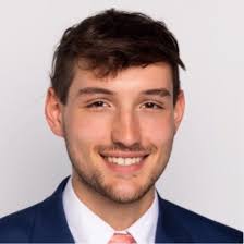 Today, I found a photo of myself from one of my first days at Mizzou,  painting the M