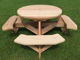 The table size and attached benches make these tables child friendly picnic tables keeping the kids together for safe and functional playgrounds. Round 45 Easy Seating Wooden Picnic Table With Benches