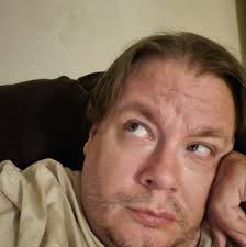 A picture of the Joker I did in college. The Joker's a character I love so  much I tried a million times to draw a picture that finally looked good  enough to