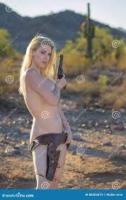 Nude Model in Desert with Gun Stock Image - Image of implied, nevada:  80303673