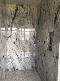 Various grout free shower wall panel thicknesses comparing cultured stone to pvc composite to high gloss acrylic to acrylic. Natural Stone In The Shower What You Need To Know