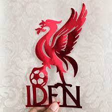 Logo is hand painted on edible wafer paper and jersey and football are rice krispie treats covered in fondant and hand painted. Liverpool Fc Cake Topper Design Craft Handmade Craft On Carousell