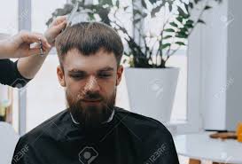 Check spelling or type a new query. Mens Haircut At Home The Hairdresser Cuts The Hair Of A Man Stock Photo Picture And Royalty Free Image Image 147817052