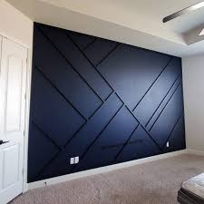 Wainscoting is often restricted to the lower portion of a wall to protect the plaster underneath. Pin By Monica Berrones On Home Dark Blue Walls Blue Accent Walls Wainscoting Bedroom