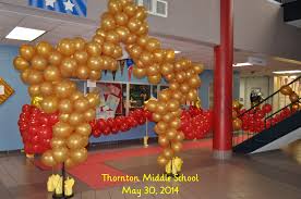 Be a star with these hollywood theme party ideas and decorations! Middle School 8th Grade Dance Hollywood Theme Student Entered Through A Red Carpet Lined With Red Ball School Dance Ideas Dance Decorations Movie Themed Party