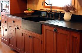 An oven cured catalyzed conversion varnish is typically applied by a professional, climate. Stained Cherry With Glazing Dull Conversion Varnish Finish Soapstone Sink And Counters Cherry Cabinets Kitchen Lodge Kitchen Cabinets Kitchen Black Counter