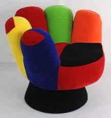 Bedroom chairs with luxurious upholstery, such as tufted velvet combine elegance and comfort in traditional settings. Funky Mitt Hand Chair For The Baseball Lover In The Family Funky Decor Funky Furniture Funky Chairs