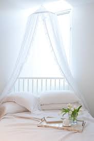 Romantic Bedroom With Sheer Canopy Over Jenny Lind Bed Transitional Bedroom Romantic Bedroom How To Dress A Bed Canopy Over Bed