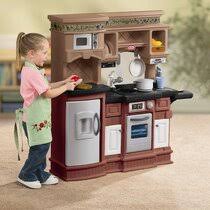 This wooden kitchen is full of fun details like a stove top, led lights, ice maker, pretend oven and refrigerator. Little Tikes Kitchen Wayfair