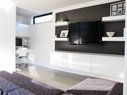 This is one of the modern tv wall unit designs, which opens up the floor space and gives the ensemble a clean look. Petite Modern Life Reviving Creativity Black Living Room Modern Family Rooms Family Room Decorating