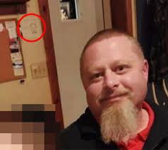 Photo shows man arrested over Delphi murders with police sketch of  suspected killer in background