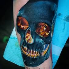 This skull is burning blue! Top 47 Flaming Skull Tattoo Ideas 2021 Inspiration Guide