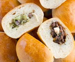 Reviewed by millions of home cooks. Baked Piroshki Russian Stuffed Rolls Curious Cuisiniere