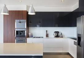 White upper cabinets above lower cabinets in a fun blue shade in a country kitchen. Two Tone Kitchen Cabinets To Inspire Your Next Redesign
